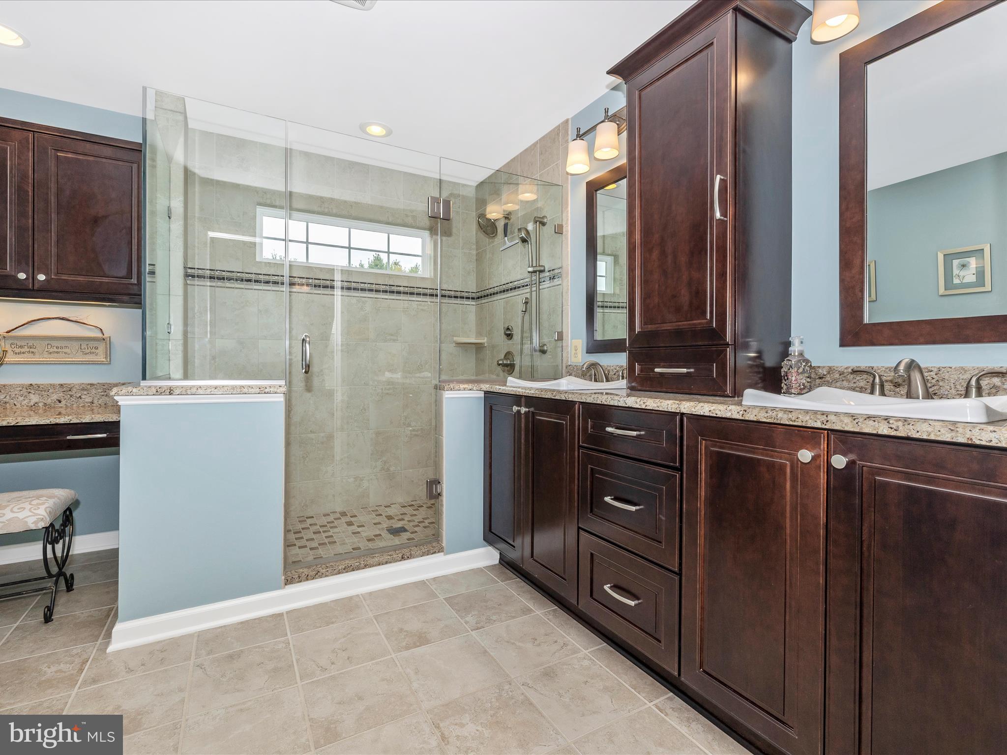 4945 Jalmia Road Mount Airy, MD 21771 - Photo 19 of 45 a bathroom with a sink double vanity and a mirror