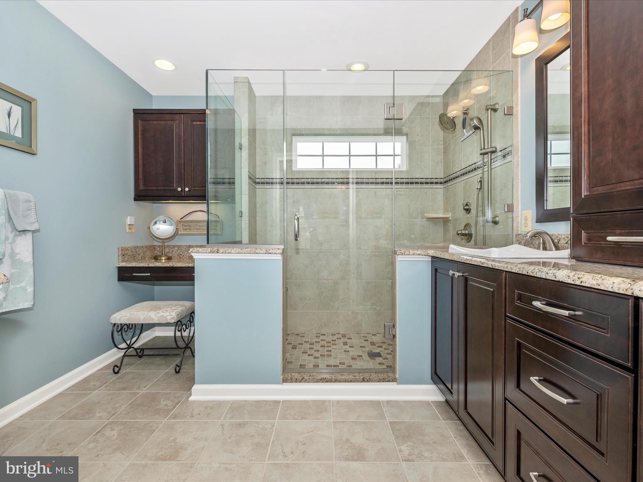 4945 Jalmia Road Mount Airy, MD 21771 - Photo 20 of 45 a bathroom with a sink a toilet and shower