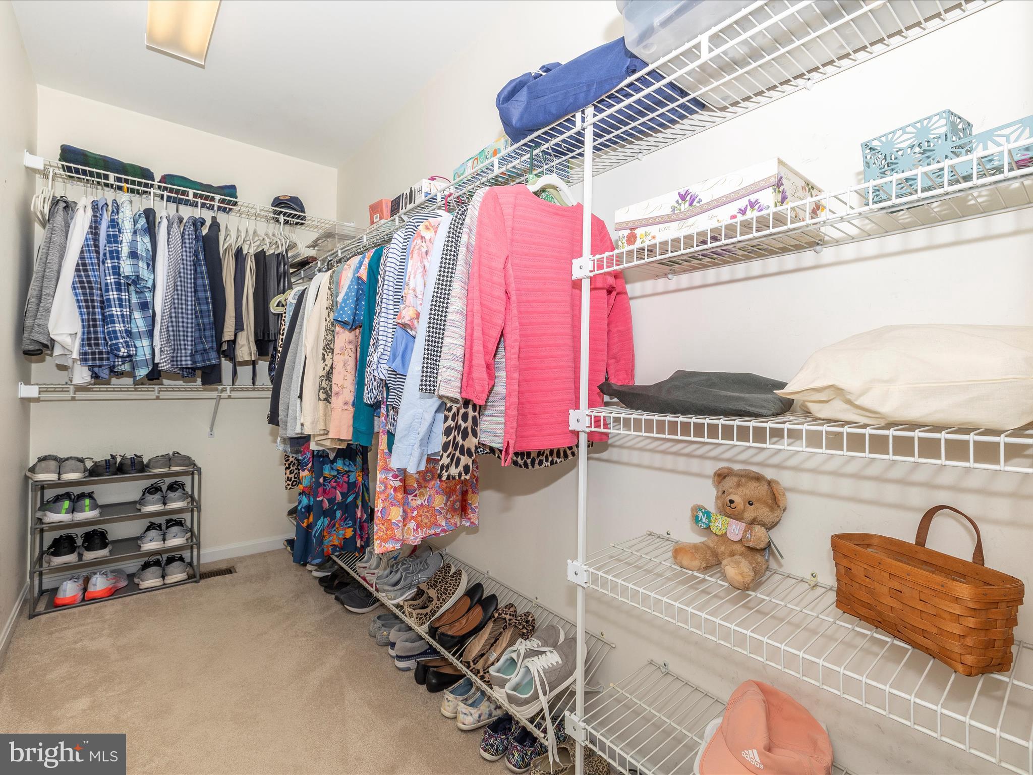 4945 Jalmia Road Mount Airy, MD 21771 - Photo 21 of 45 a view of walk in closet with clothes and shoes