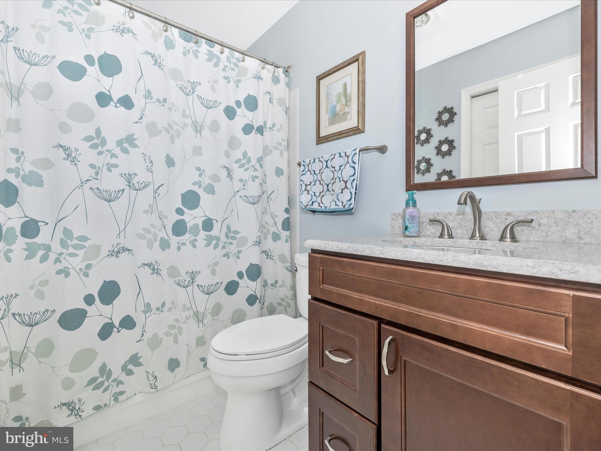 4945 Jalmia Road Mount Airy, MD 21771 - Photo 25 of 45 a bathroom with a sink toilet and shower