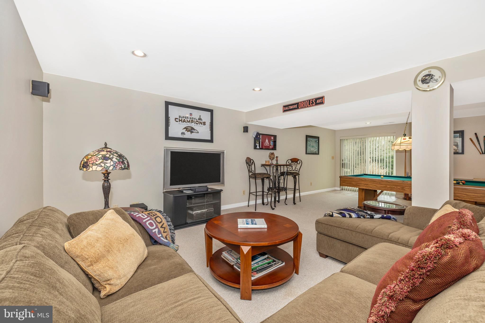 4945 Jalmia Road Mount Airy, MD 21771 - Photo 27 of 45 a living room with furniture a flat screen tv and a window