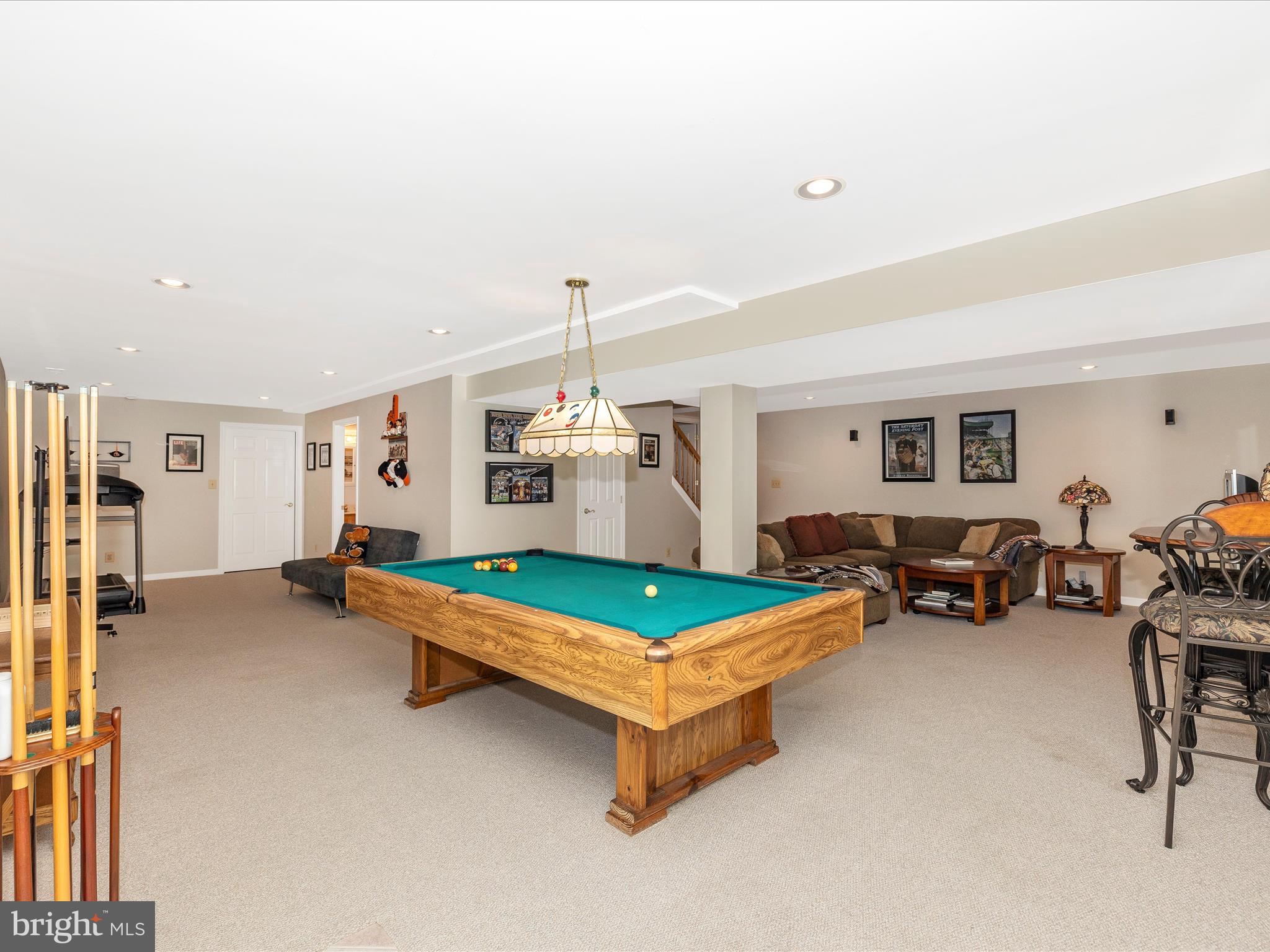 4945 Jalmia Road Mount Airy, MD 21771 - Photo 28 of 45 a room with furniture and a chandelier