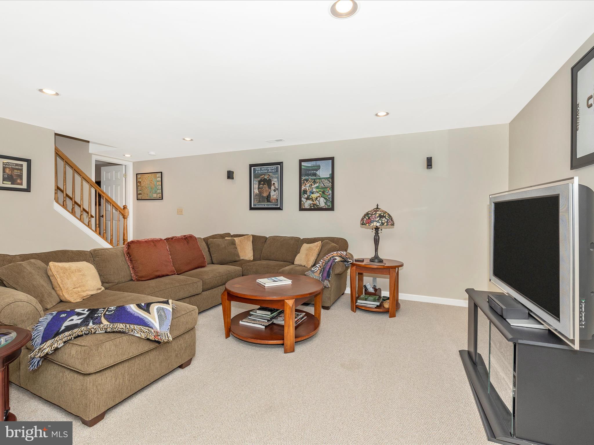4945 Jalmia Road Mount Airy, MD 21771 - Photo 29 of 45 a living room with furniture and a flat screen tv