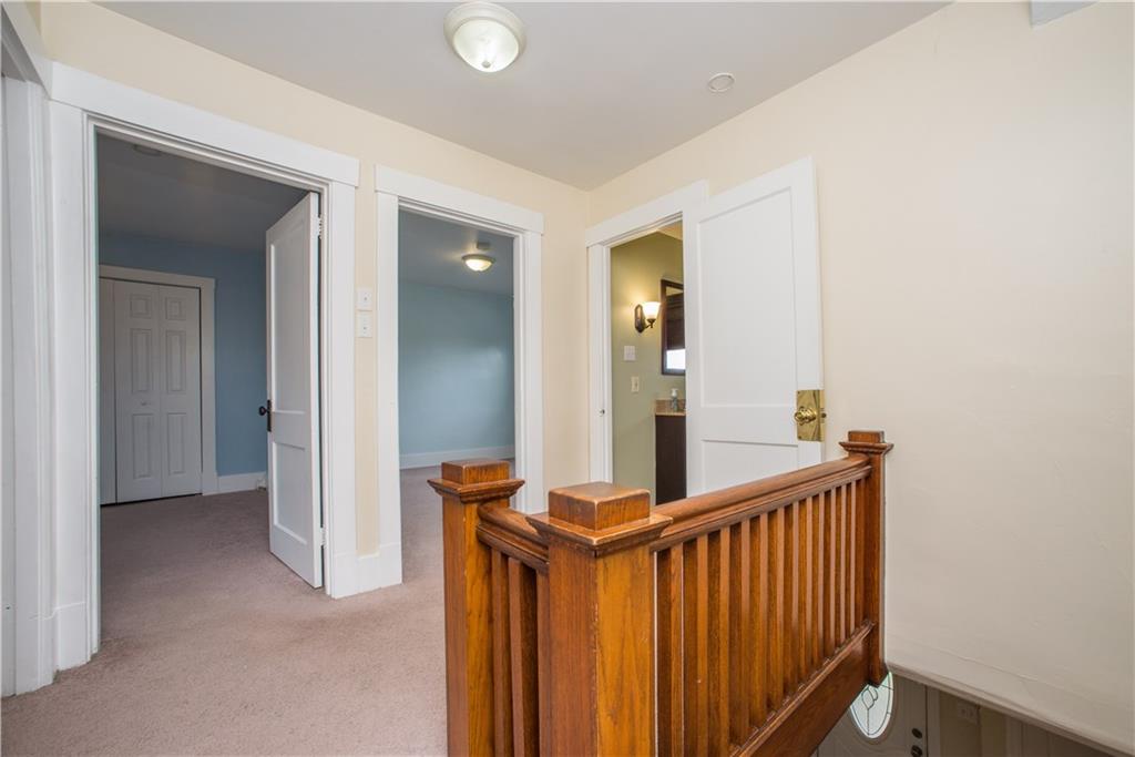 128 Marham Road Homestead, PA 15120 - Photo 18 of 24 Large hall way in the upstairs with the charming banisters again!