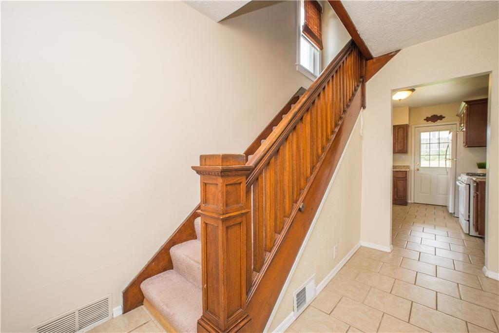 128 Marham Road Homestead, PA 15120 - Photo 9 of 24 The view inside the front door. Charming original banisters.