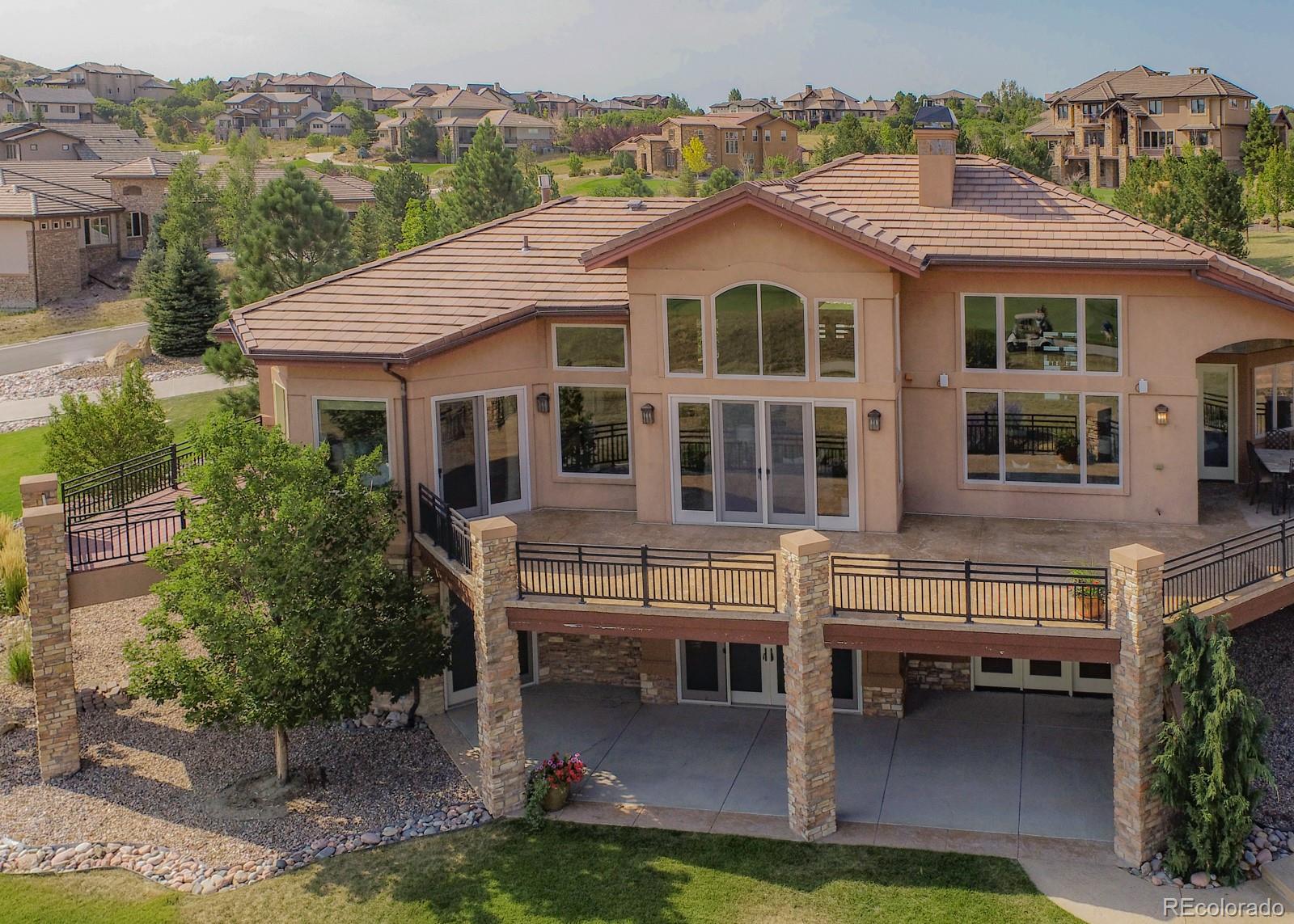 5241 Raintree Circle Parker, CO 80134 - Photo 1 of 36 a aerial view of a house with swimming pool