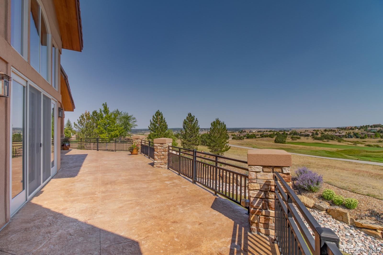 5241 Raintree Circle Parker, CO 80134 - Photo 16 of 36 a view of a lake and outdoor space
