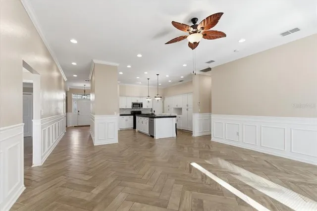 a view of a kitchen with a stove cabinets and a fireplace