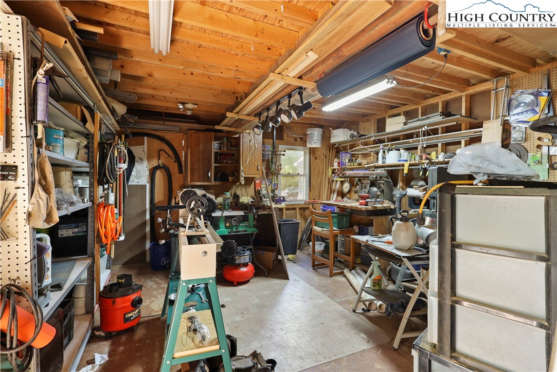 1848 Howard's Creek Road Boone, NC 28607 - Photo 45 of 49 a view of a storage room with furniture