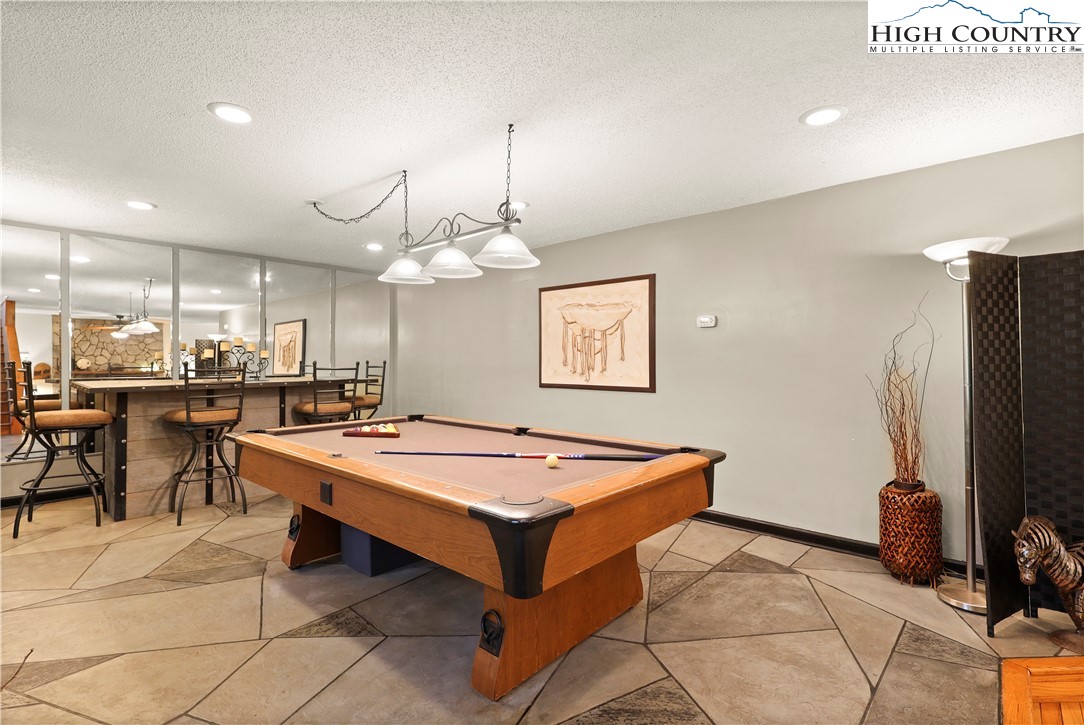 1848 Howard's Creek Road Boone, NC 28607 - Photo 7 of 49 a room with pool table and flat screen tv