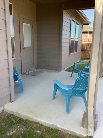 a room with furniture and a window
