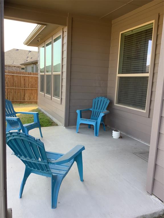 156 Hawksbill Lane Rhome, TX 76078 - Photo 17 of 19 a room with furniture and a window