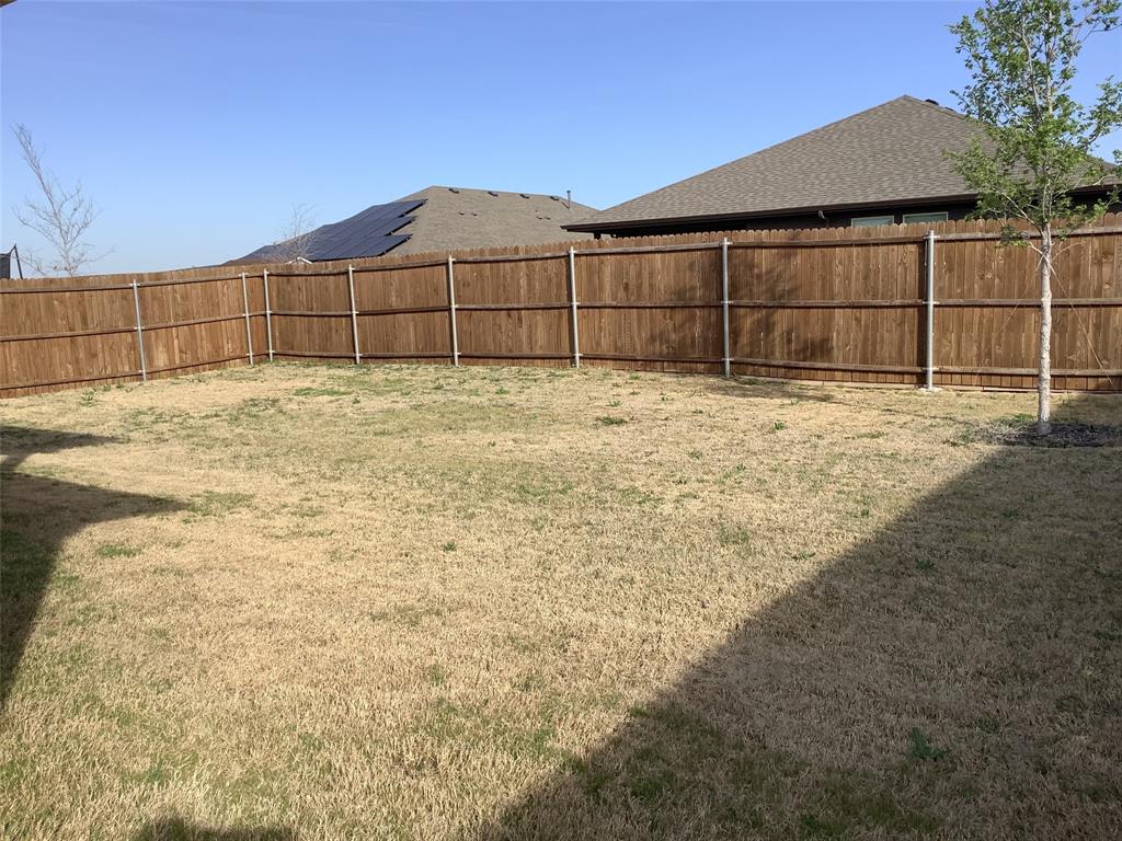 156 Hawksbill Lane Rhome, TX 76078 - Photo 2 of 19 a view of a backyard