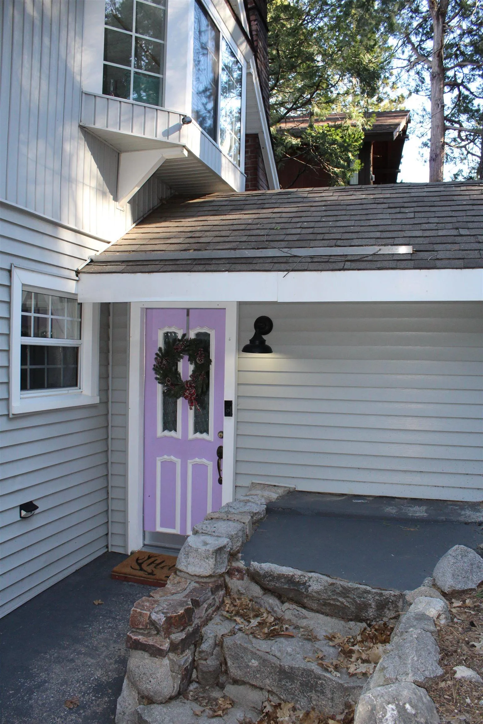 a front view of a house with entryway
