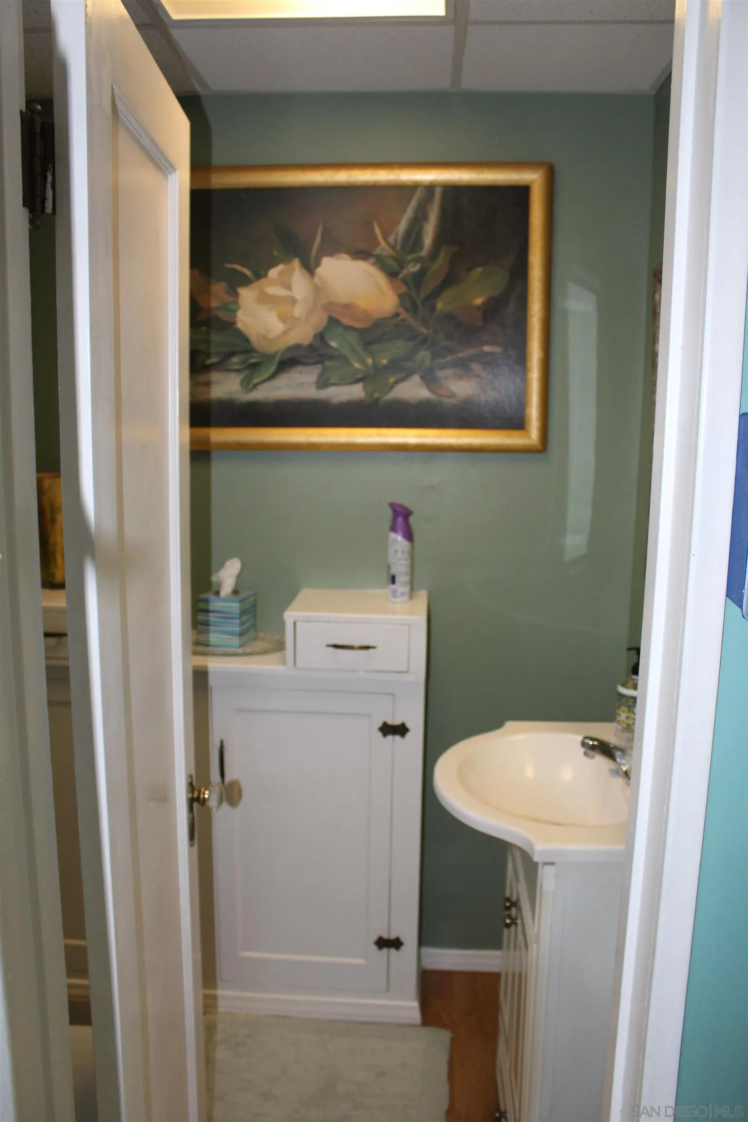 23984 Skyland Drive Crestline, CA 92325 - Photo 12 of 35 a bathroom with a toilet and a sink
