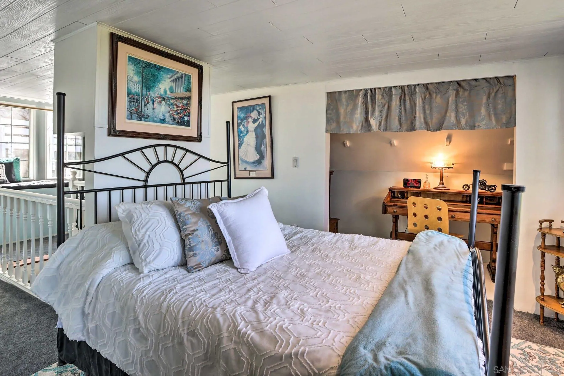 23984 Skyland Drive Crestline, CA 92325 - Photo 15 of 35 a bedroom with a bed and a flat screen tv