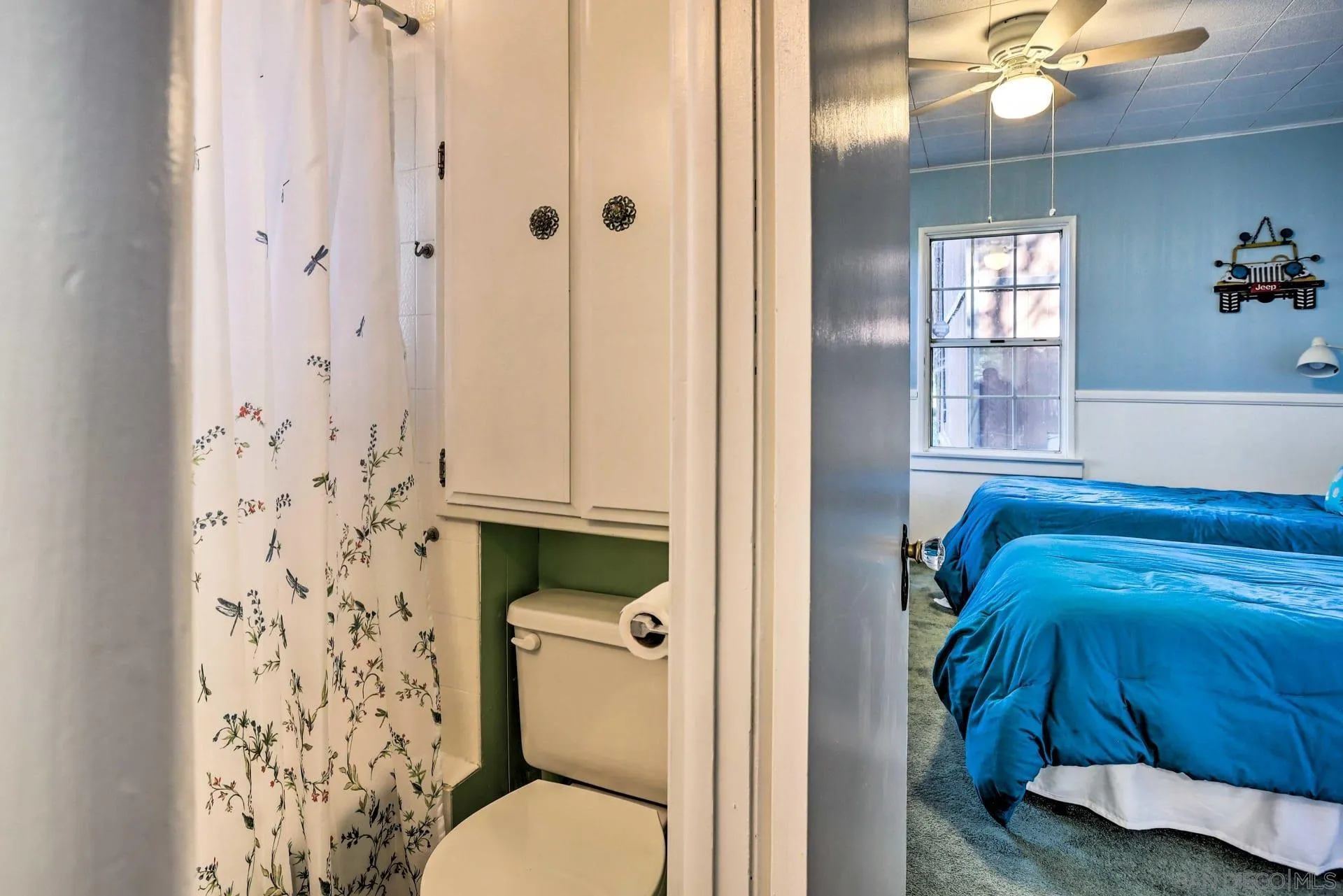 23984 Skyland Drive Crestline, CA 92325 - Photo 21 of 35 a bathroom with a toilet and shower