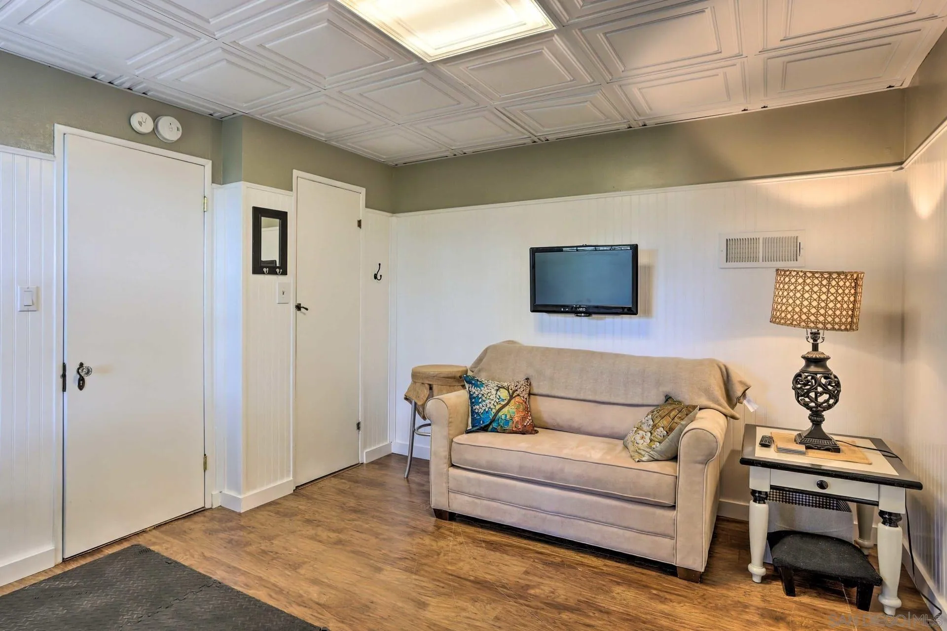 23984 Skyland Drive Crestline, CA 92325 - Photo 22 of 35 a living room with furniture and wooden floor