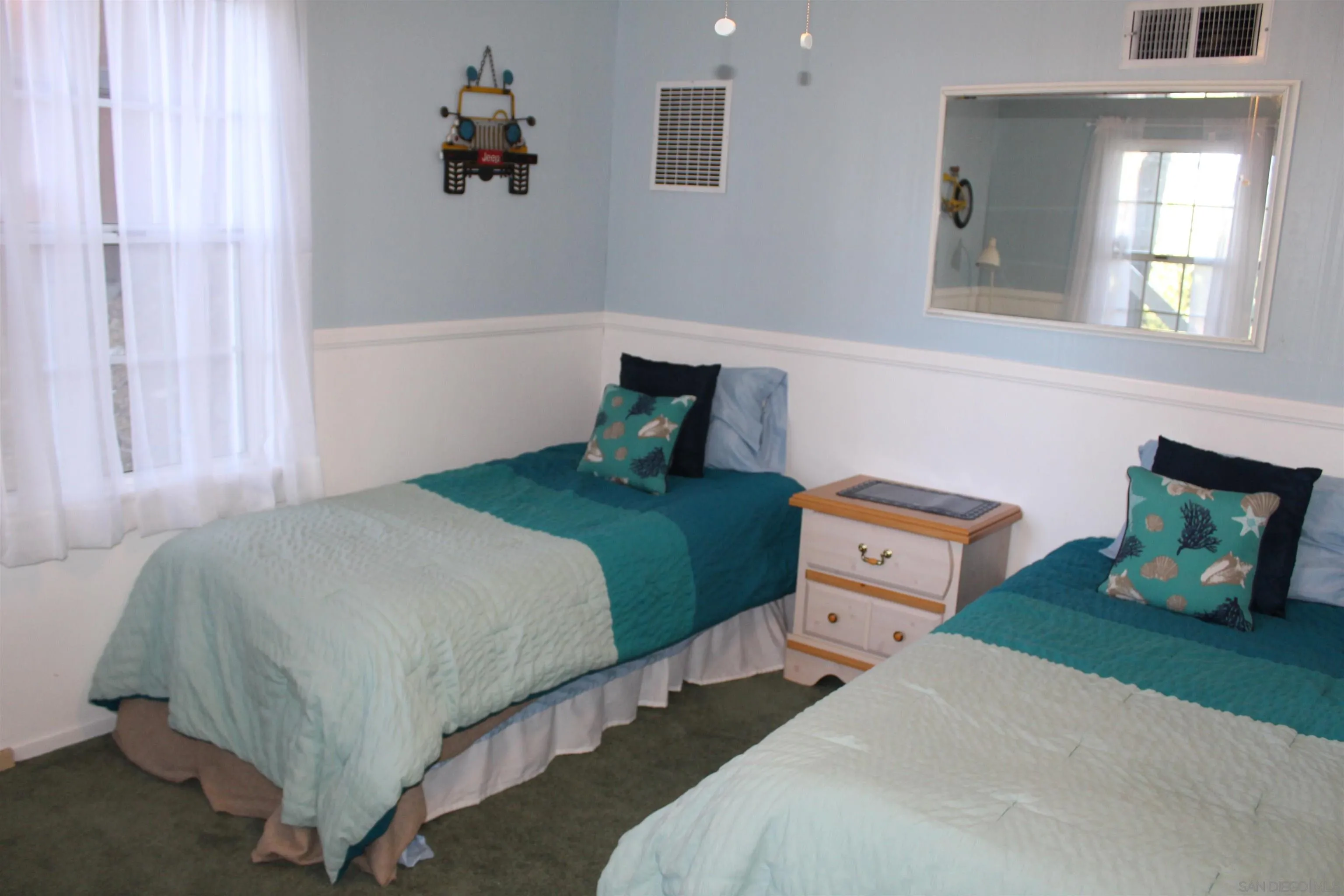 23984 Skyland Drive Crestline, CA 92325 - Photo 25 of 35 a bedroom with a bed and window