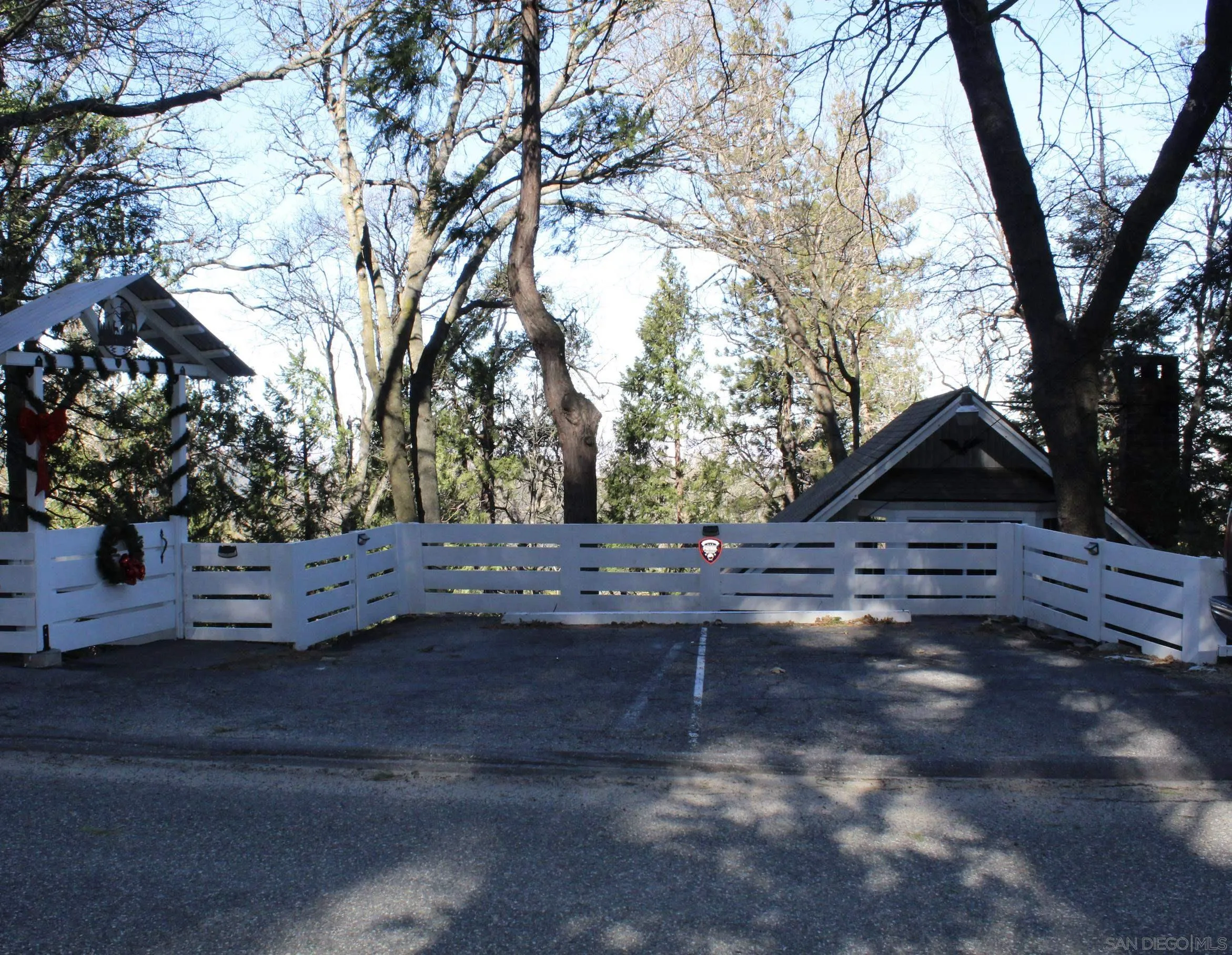 23984 Skyland Drive Crestline, CA 92325 - Photo 35 of 35 a view of tree outside of a house