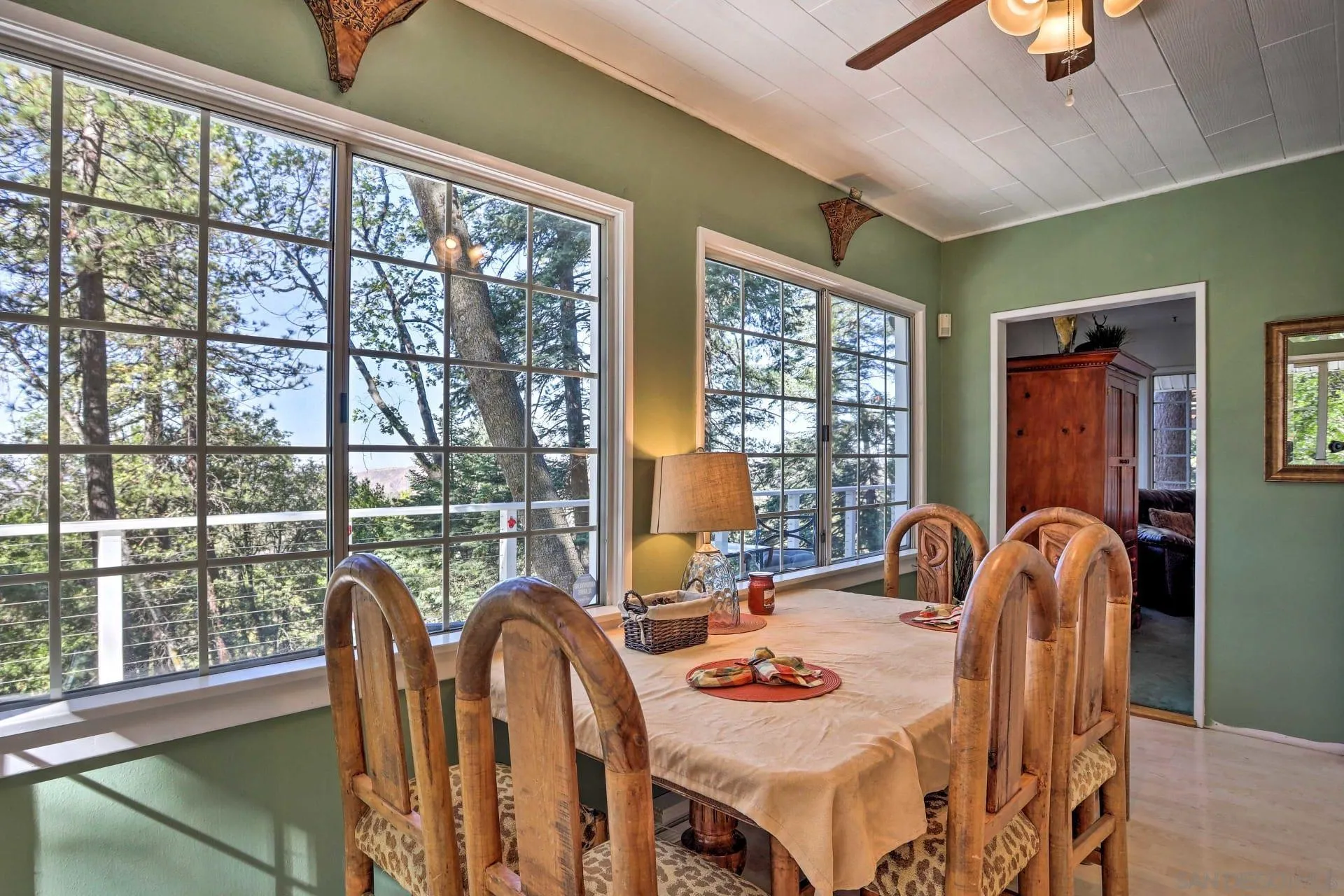 23984 Skyland Drive Crestline, CA 92325 - Photo 9 of 35 a dining room with furniture a chandelier and window
