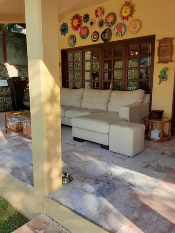 a view of a lobby with a couch and a fireplace
