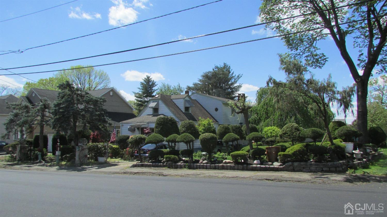 19 Hillsdale Road Edison, NJ 08820 - Photo 1 of 13 a front view of a house with a yard and garage