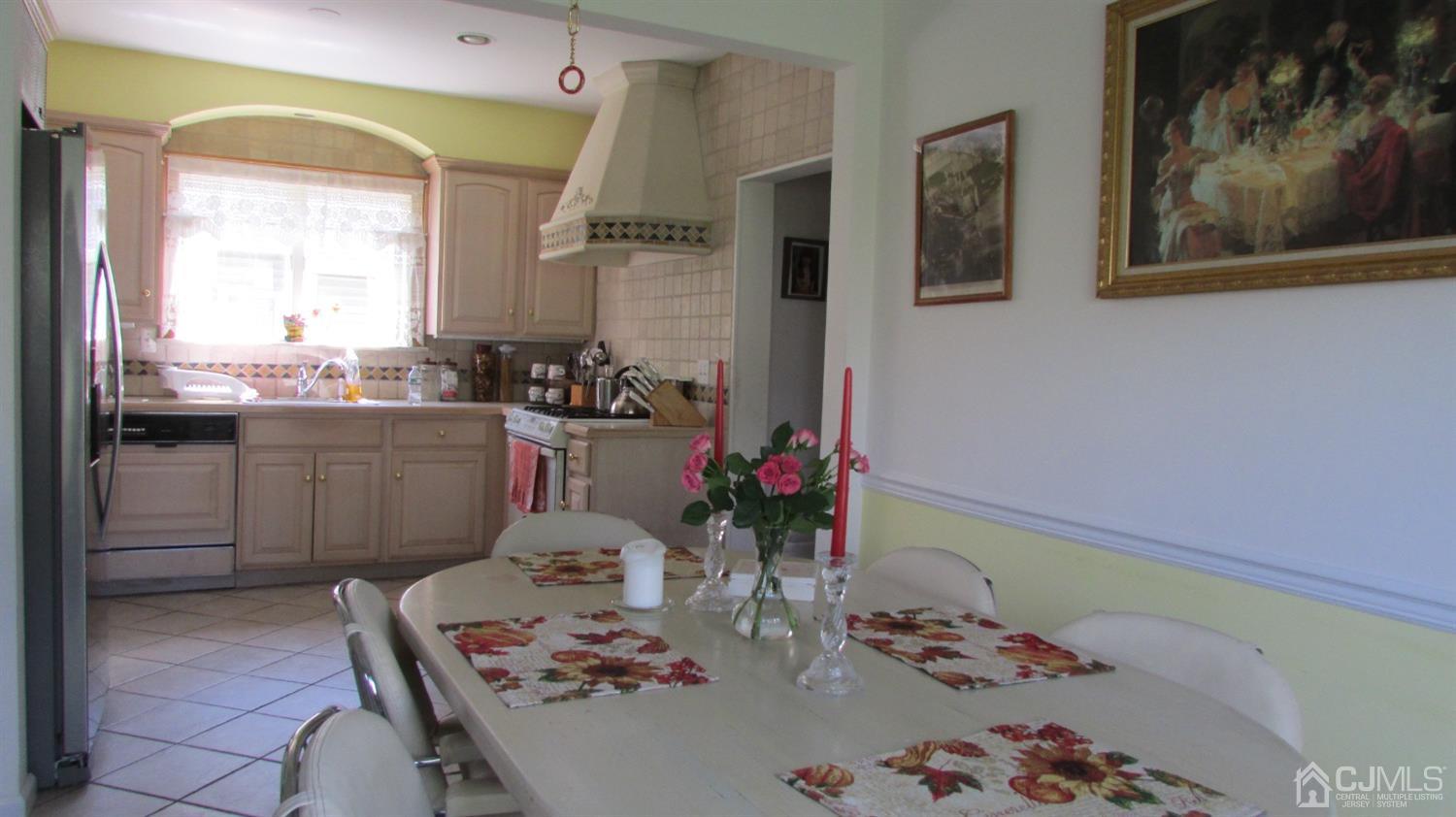 19 Hillsdale Road Edison, NJ 08820 - Photo 8 of 13 a view of a dining room with furniture