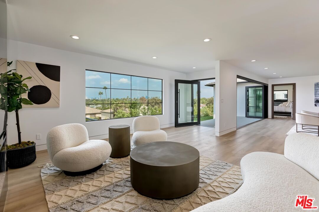 5236 Sanchez Drive Los Angeles, CA 90008 - Photo 6 of 32 a living room with furniture and a large window