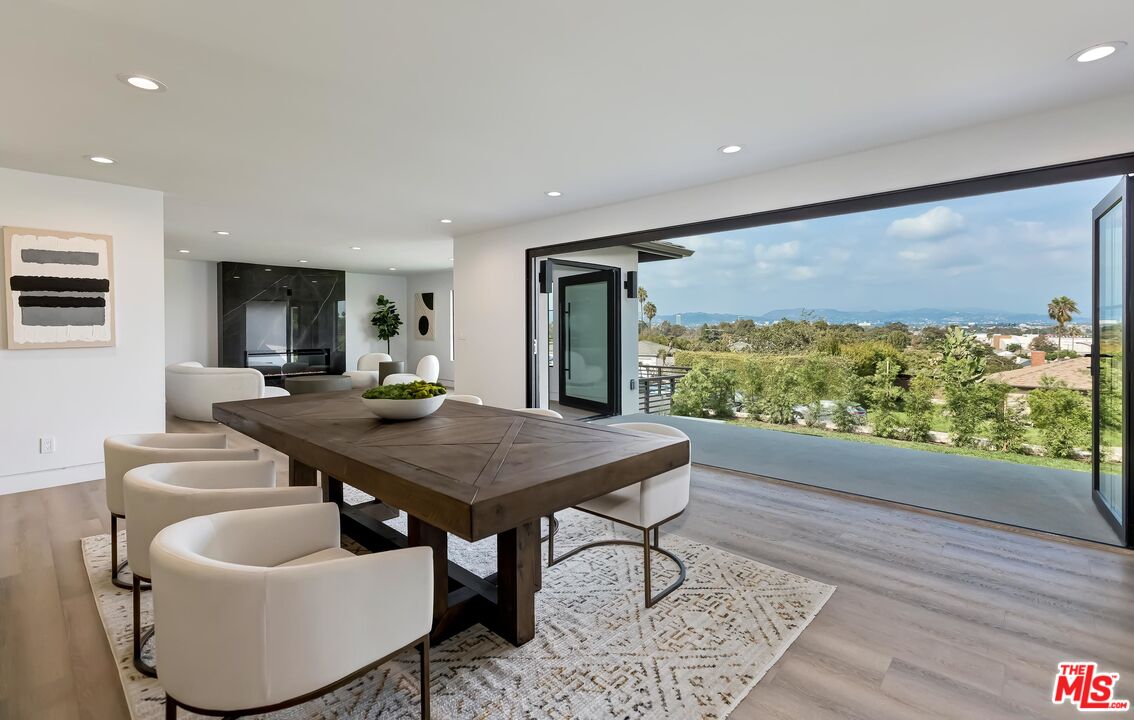 5236 Sanchez Drive Los Angeles, CA 90008 - Photo 8 of 32 a room with furniture and a large window