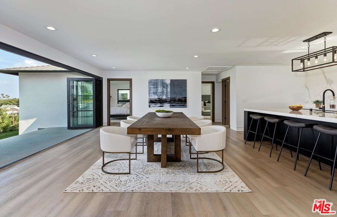 5236 Sanchez Drive Los Angeles, CA 90008 - Photo 9 of 32 a living room with furniture and a wooden floor