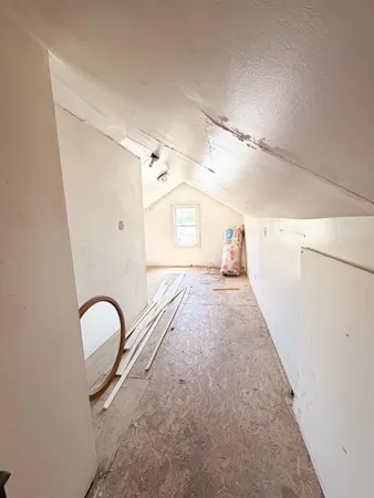 a view of hallway with windows