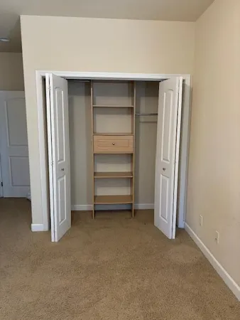 a view of room and closet area