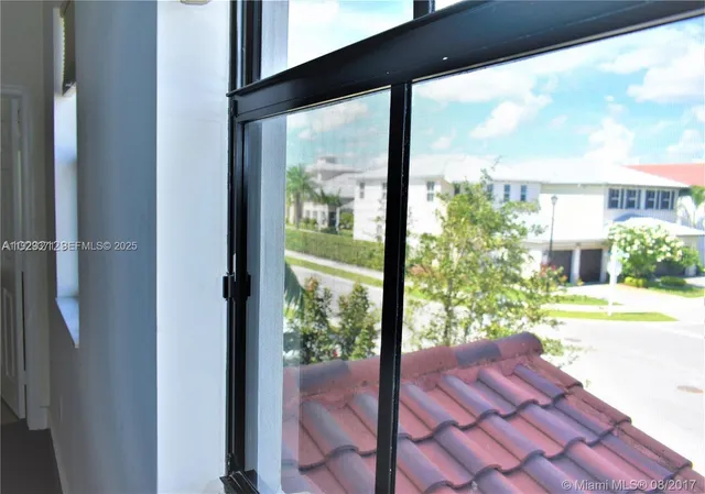 a view of a house with entryway and windows