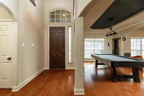 a view of a livingroom with furniture and window