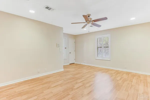 a view of a room with racks on the wall