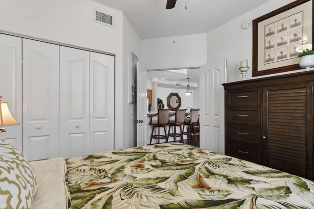 a bedroom with a bed and a dresser