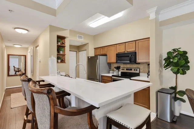a view of a dining room with furniture