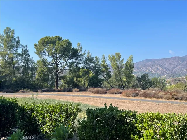 a view of a backyard of the house
