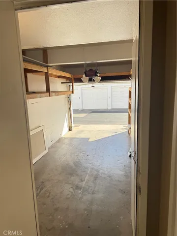 a view of a room with wooden walls