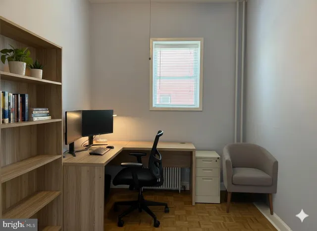 a bathroom with a sink a mirror and shower