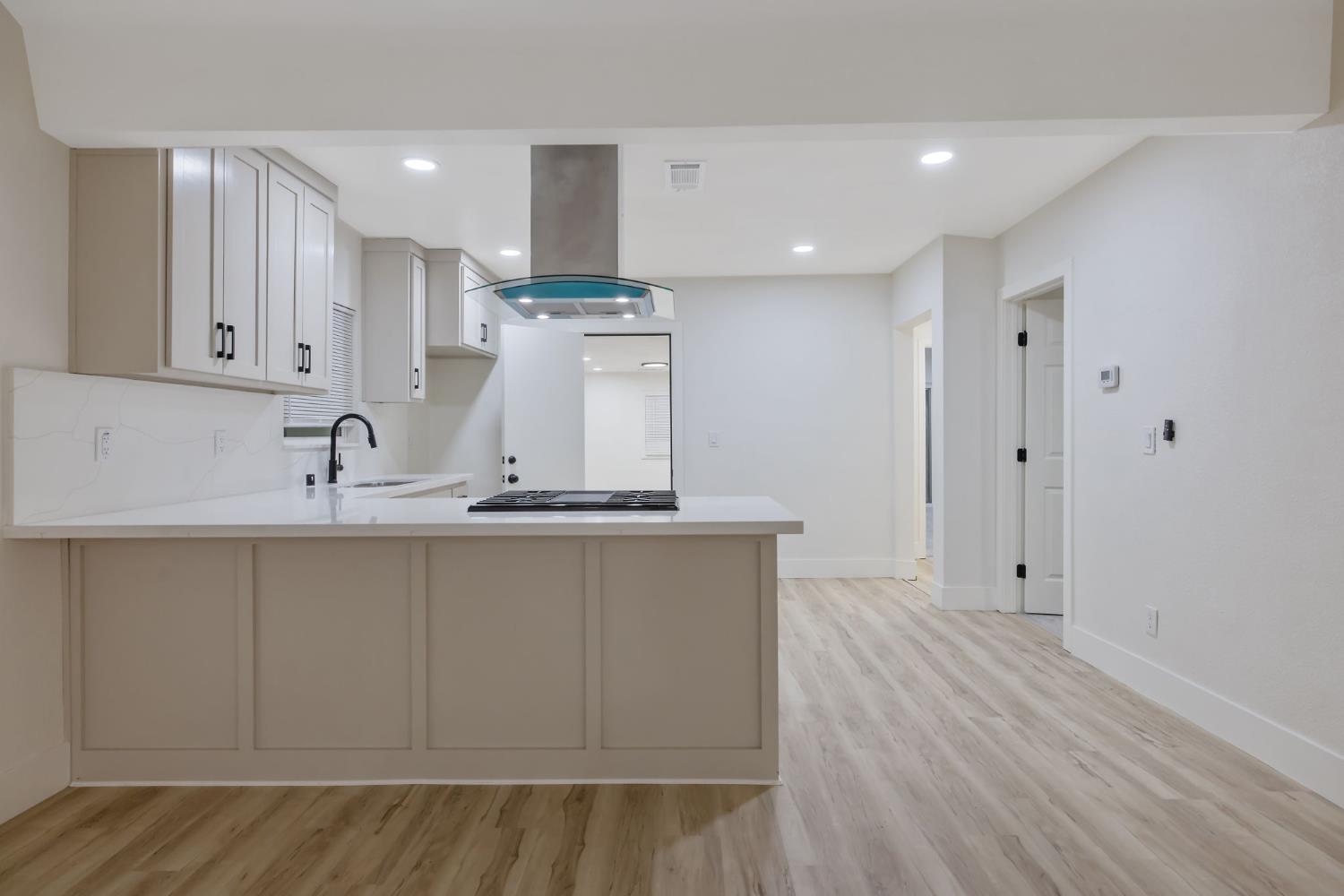 1402 Middleton Street Hanford, CA 93230 - Photo 18 of 40 a view of kitchen with stainless steel appliances cabinets