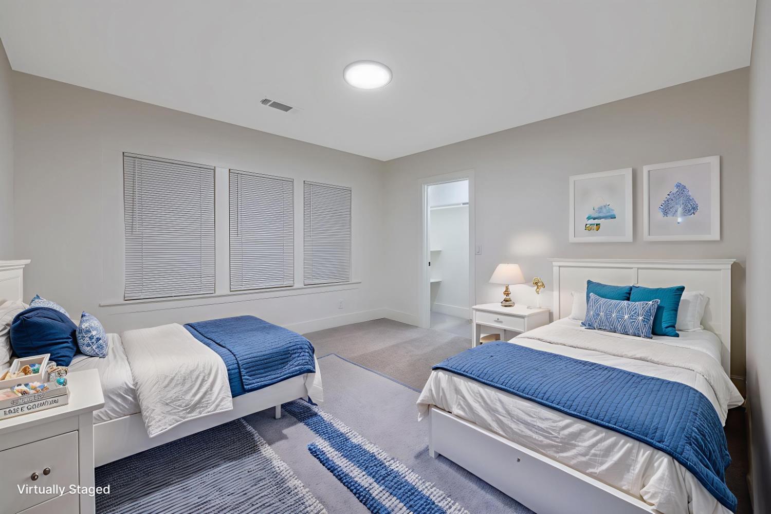 1402 Middleton Street Hanford, CA 93230 - Photo 23 of 40 a bedroom with a bed and a couch