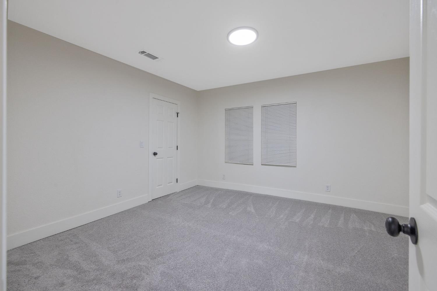 1402 Middleton Street Hanford, CA 93230 - Photo 9 of 40 a view of an empty room