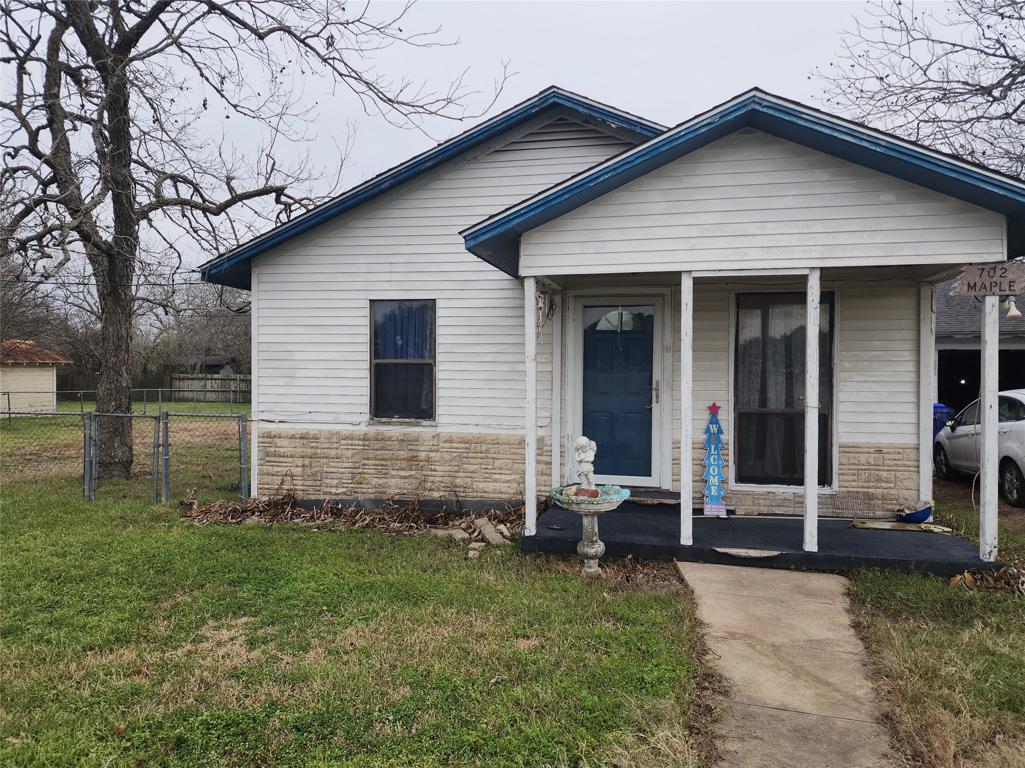 702 Maple Street Yoakum, TX 77995 - Photo 3 of 7 a front view of a house with a yard