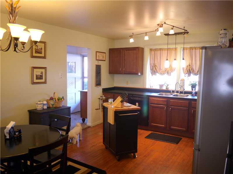 926 Beaver Road Ambridge, PA 15003 - Photo 4 of 13 Kitchen. Lovely remodeled kitchen with lots of natural light overlooking the sweet porch and a huge dining area and all open to the living room.