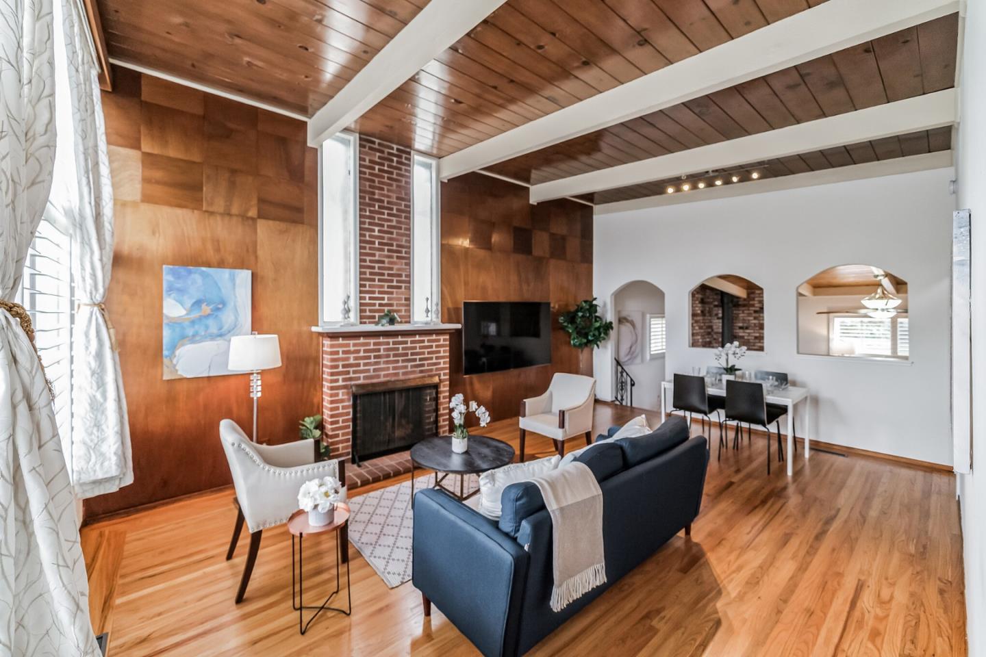 2933 Hardeman Street Hayward, CA 94541 - Photo 3 of 35 a living room with fireplace furniture and a large window