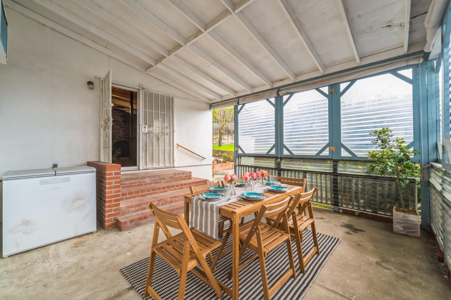 2933 Hardeman Street Hayward, CA 94541 - Photo 7 of 35 a dining room with furniture and a large window