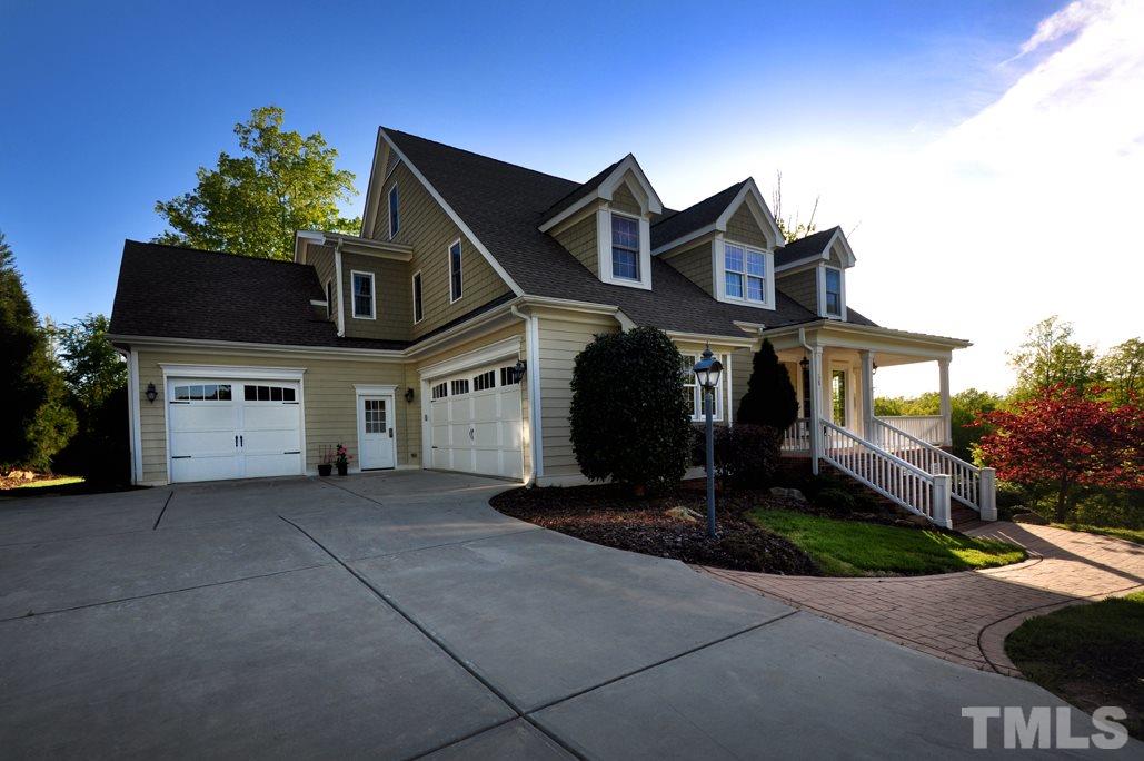 58 Lookout Ridge Pittsboro, NC 27312 - Photo 2 of 25 3 car garage with ample storage. Need more room? Third floor unfinished walkup!
