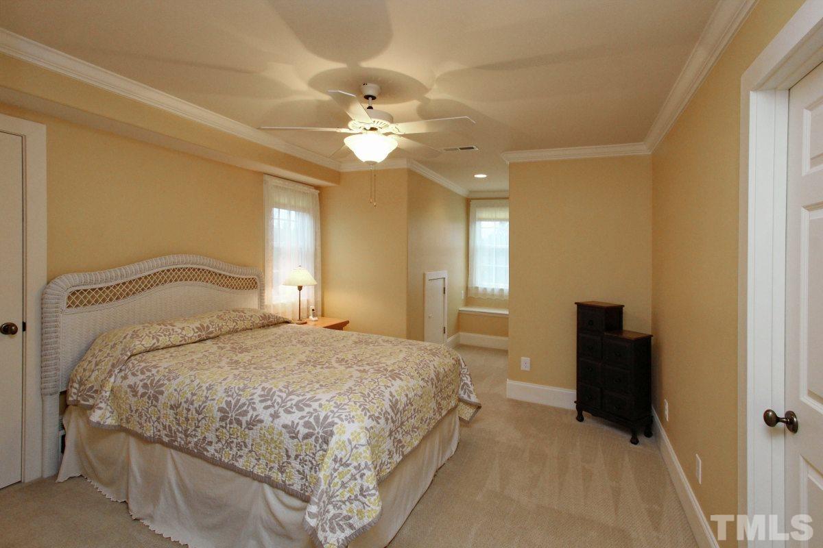 58 Lookout Ridge Pittsboro, NC 27312 - Photo 16 of 25 Spacious guest bedroom with walk-in closet, jack and jill bath, built-in window seat with storage.